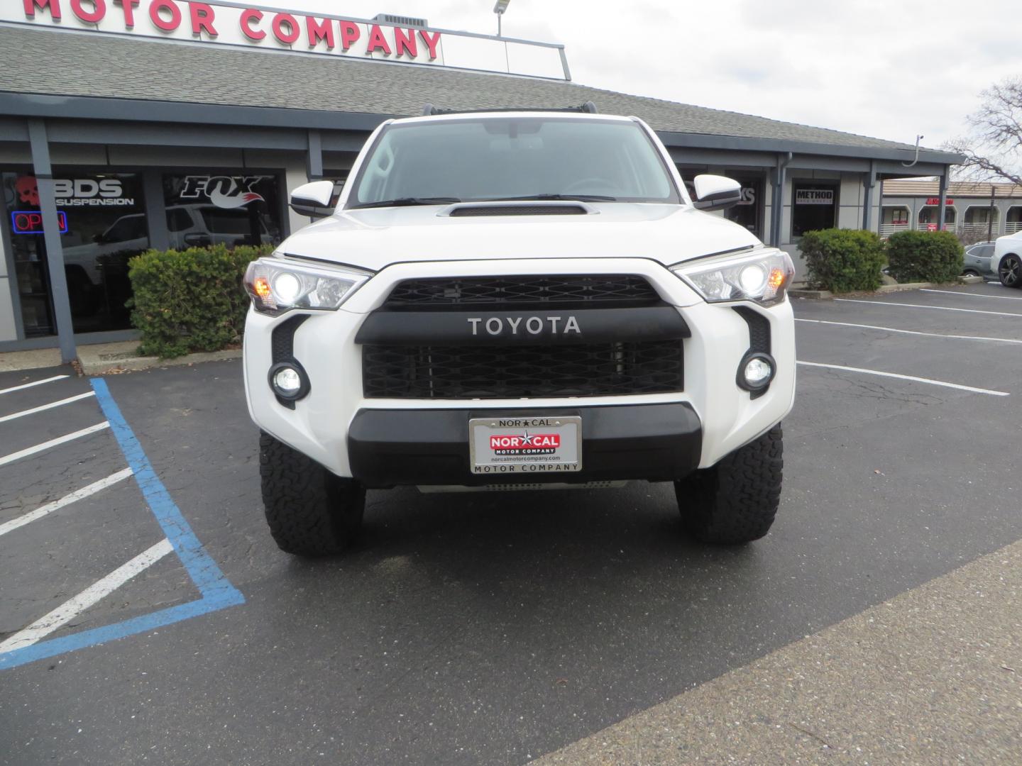 2019 White /BLACK Toyota 4Runner TRD Pro (JTEBU5JR3K5) with an 4.0L V6 engine, 5 -Speed Automatic transmission, located at 2630 Grass Valley Highway, Auburn, CA, 95603, (530) 508-5100, 38.937893, -121.095482 - Features Ironman 4X4 suspension, BFG tires, Rockslider, Roof rack, window tint, and interior Rago Fab Molle storage racks. - Photo#1